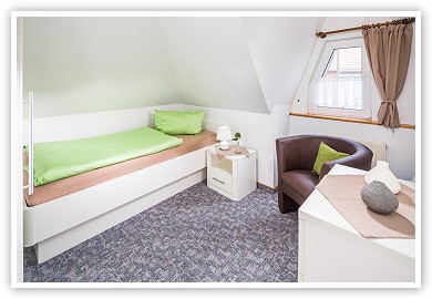 Zweites Schlafzimmer mit Einzelbett